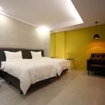 Yellow wall in the bedroom