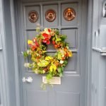 Bright Christmas wreath on the door