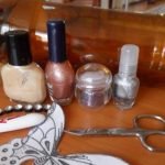 Nail polish, scissors and pattern