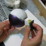 Apply white paint with a sponge