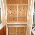 Wardrobe with wooden shelves