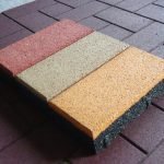 Paving slabs with rubber filling