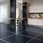 Black floor tiles to the kitchen