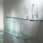 Glasses on a glass shelf