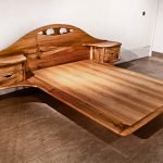 Wooden bed in the bedroom