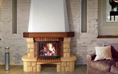 Paano palamutihan ang isang fireplace: tiling, artipisyal na bato