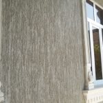 Stucco molding around the windows